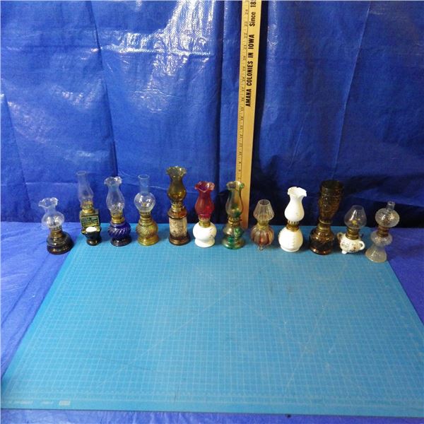 lot of miniature coal oil lamps