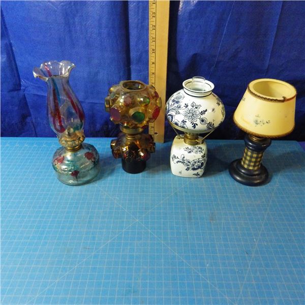 lot of miniature coal oil lamps