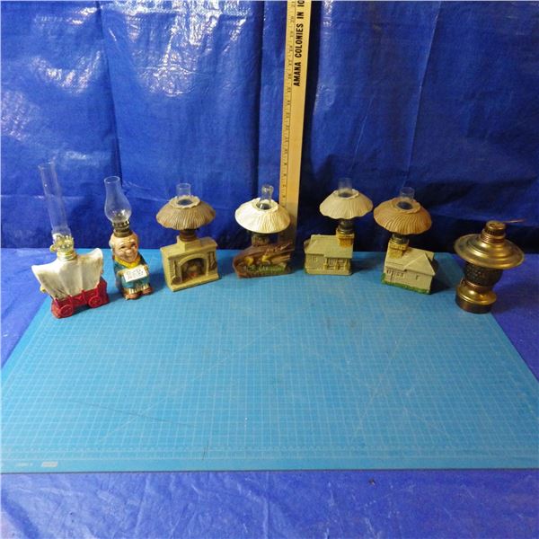 lot of miniature coal oil lamps