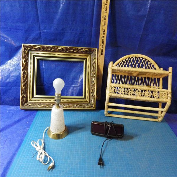 picture frame , Wicker shelf, light, Digital clock