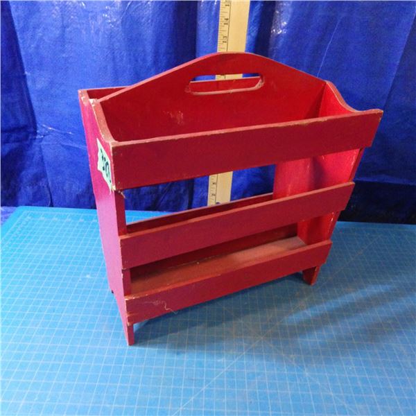 Wood magazine rack painted red