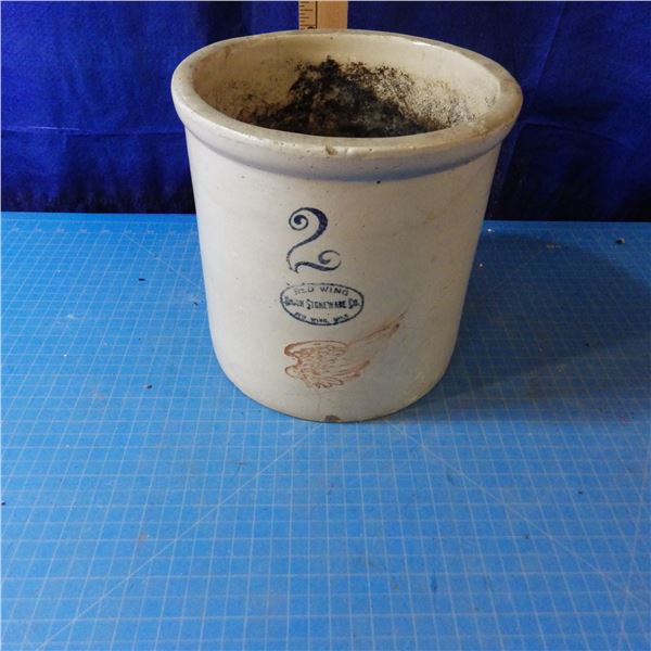 2 gallon Red Wing crock used as flower planter