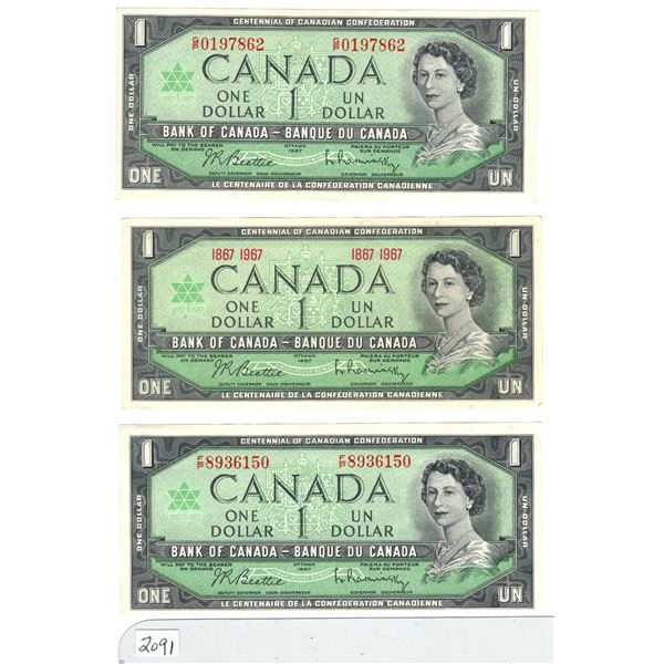 lot of three Canadian $1 bills