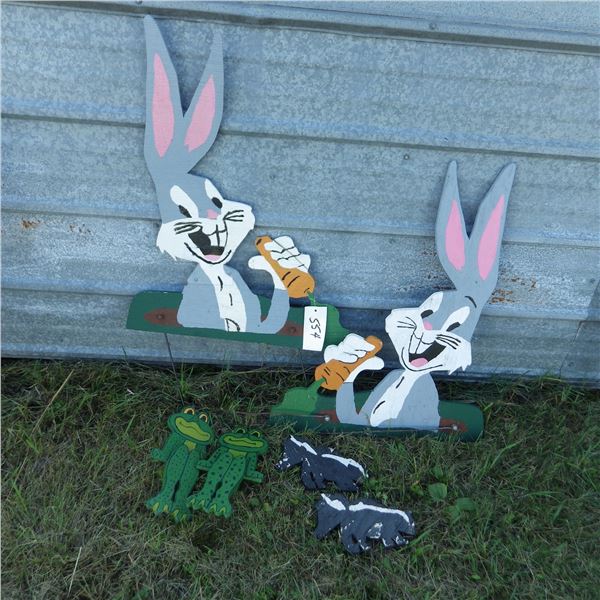 Wood cutouts of frogs etcetera