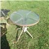 Image 1 : Small glass top patio table