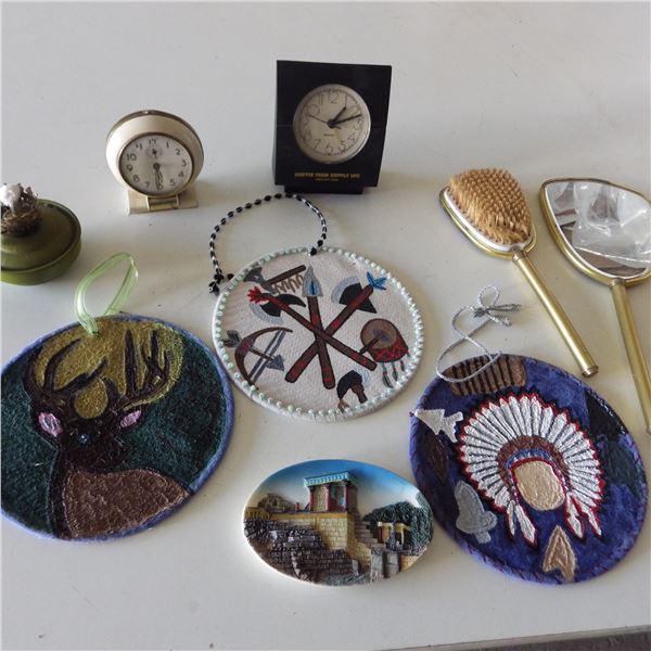 Small clocks, dressing mirror and hair brush , wall hangings