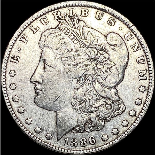 1886-O Silver Morgan Dollar ABOUT UNCIRCULATED