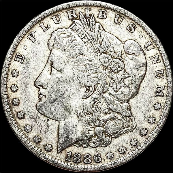 1886-O Silver Morgan Dollar ABOUT UNCIRCULATED