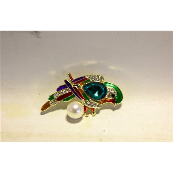 PARROT BROOCH FILLED WITH RHINESTONES