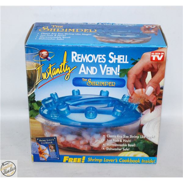 THE SHRIMPER INSTANTLY REMOVES SHELLS