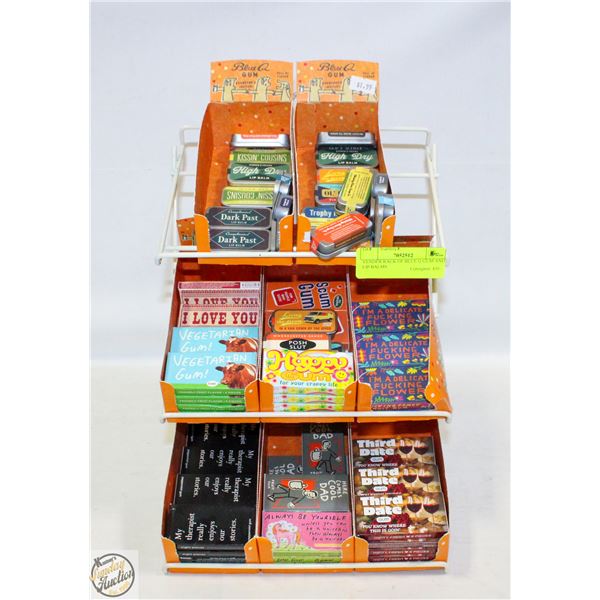 VENDER RACK OF BLUE Q GUM AND LIP BALMS