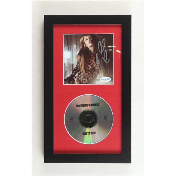 MILEY CYRUS SIGNED AND FRAMED CD COVER - ACOA