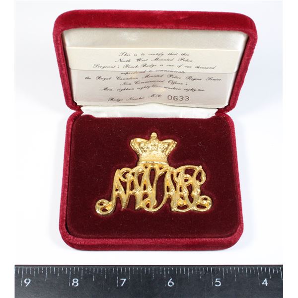 #302 1982 NORTH WEST MOUNTED POLICE POUCH BADGE