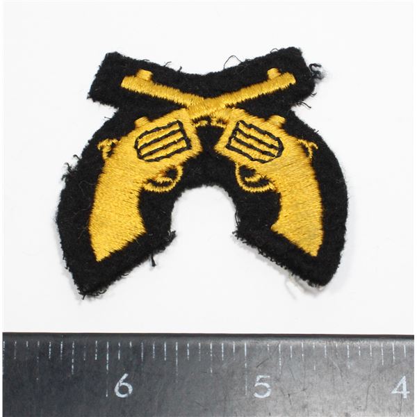 #312 RCMP CROSSED REVOLVERS BADGE YELLOW SILK