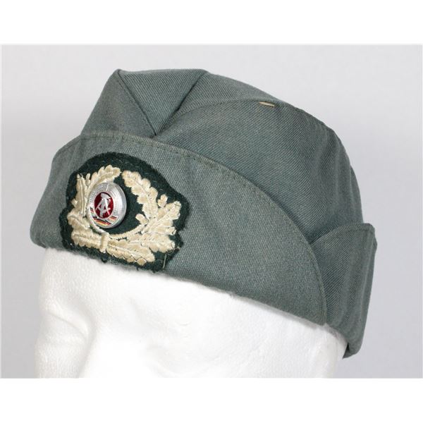 #583  EAST GERMAN WEDGE CAP MILITARY METAL/CLOTH