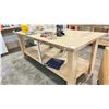 Image 1 : 2 WORKBENCHES WITH CONTENTS. 7'X3' AND 90"X42". RIDGID BATTERY RADIO, CLOCK, SCREWS, SPRAY CANS, ETC