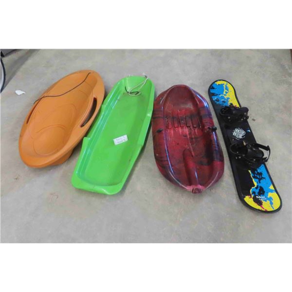 3 Plastic Sleds & 1 Snowboard 