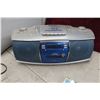 Image 4 : 3 Portable Combo Radios/CD/Cassette Players and CD's