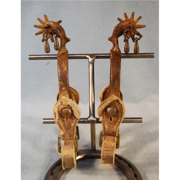 2 pair of spurs: Buermann-style drop shank iron spurs with jingle bobs & Crockett -Rinalde chromed s