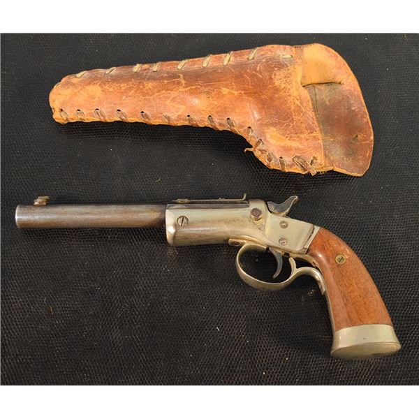 Stevens Model 41 single shot .22 pistol, wood grips, leather holster