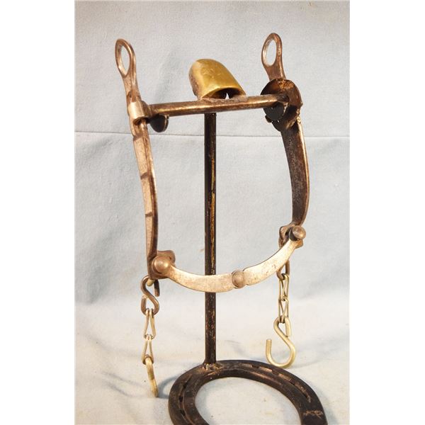 G.S. Garcia silver mounted spade bit, swivel cheek with roller and rein chains, some restoration