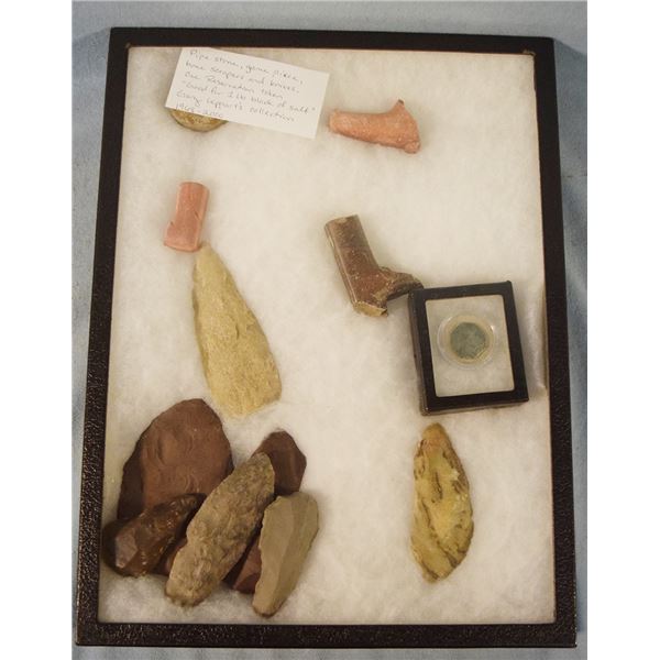 (2) Riker Cases: 12 pipe stone, game pieces, scrapers & 25 copper beads, blanks, breast shield, arro