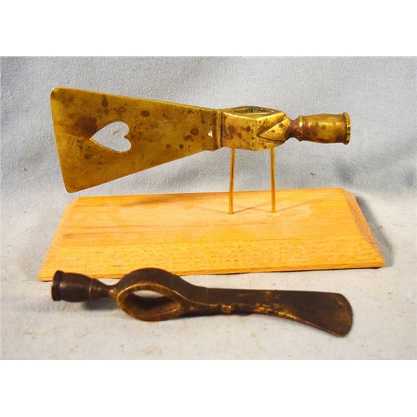 2 pcs: Brass tomahawk with heart cut out w/stand & iron axe head