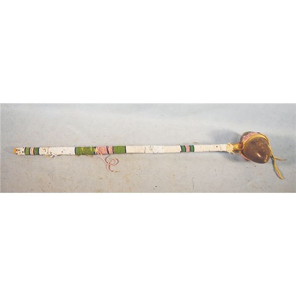 War club with beaded handle