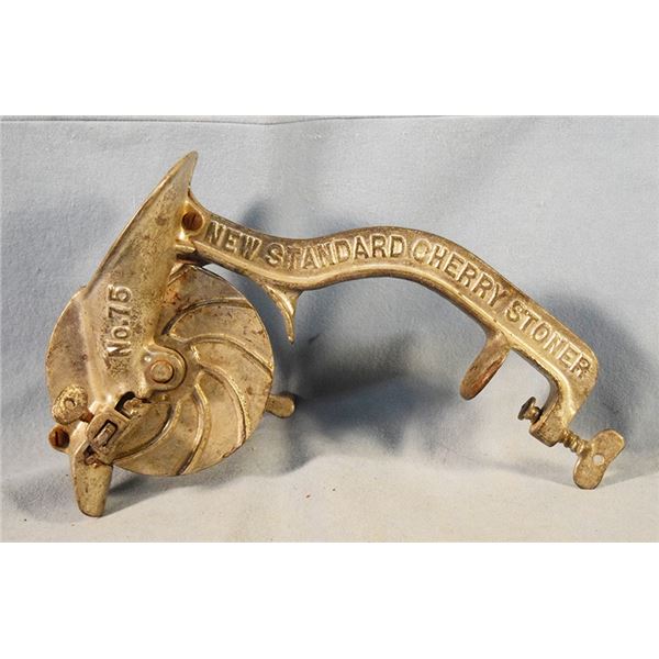 New Standard cast iron Cherry pitter, No. 75, made by New Standard Corporation, Mt. Joy, PA, 10.5" l