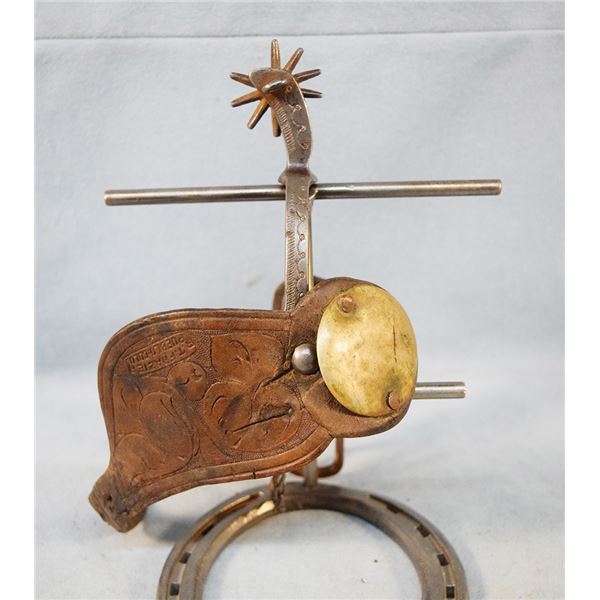California-style women's spur with R.T. Frazier stamp with concho