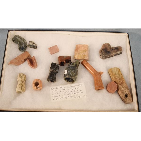 Riker case: 15 Catlinite and Steatite pipe bowls/pieces, found in ND