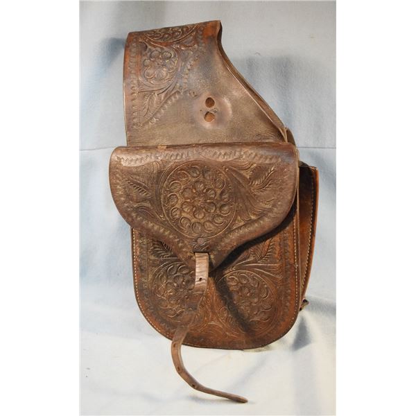 2 pcs.: Braided bull whip, 80" long and Unmarked small saddle bags, 7.5" x 9", nicely tooled