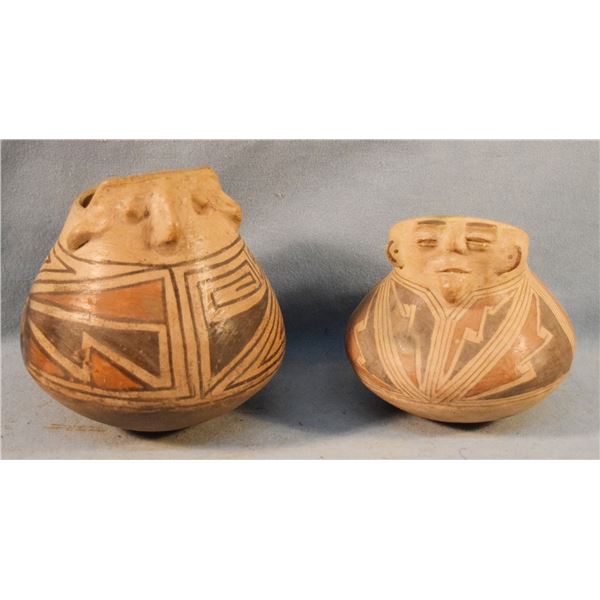 (2) Native American (SW) pots with faces, 6.5" tall and 4.5" tall, larger pot cracked