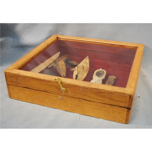 (7) Alaskan artifacts, cased
