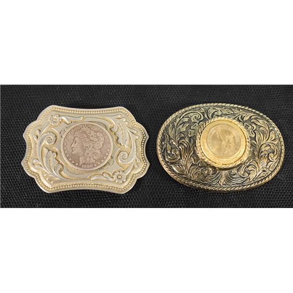 (2) Belt buckles, one with silver dollar and one gold & black