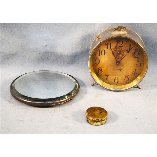 3 pcs: Pewter hand mirror, missing handle; Pioneer clock & small tin