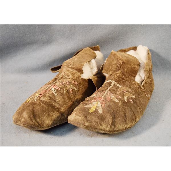 Pair of well worn beaded Northern Plains Indian moccasins