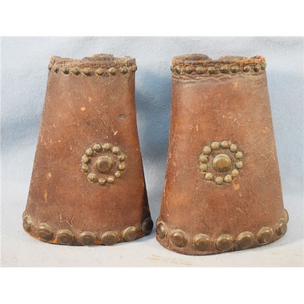 Pair of leather cowboy cuffs, 7" tall