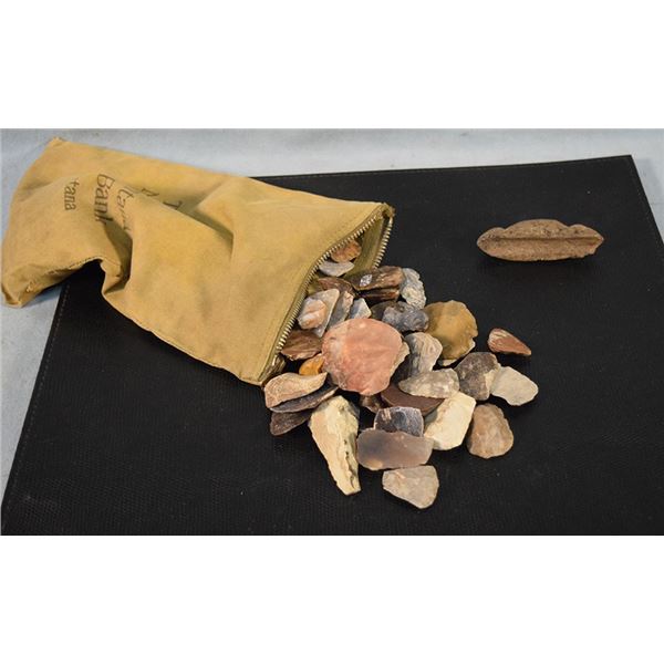 Bank bag full of thumb scrapers and a shaft straightener