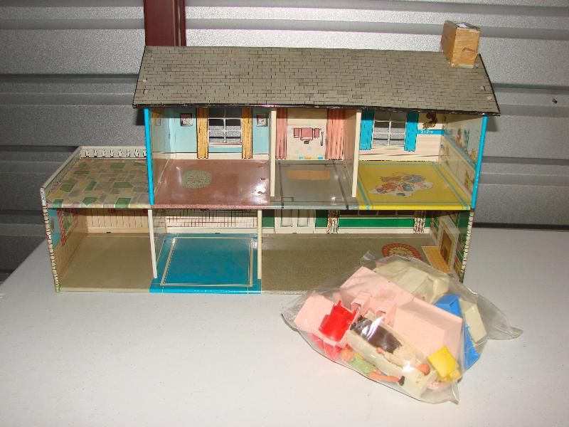 old metal dollhouse