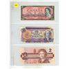 Image 1 : 1954 $2, 1971 $10, 1986 $2 Canadian Dollar.