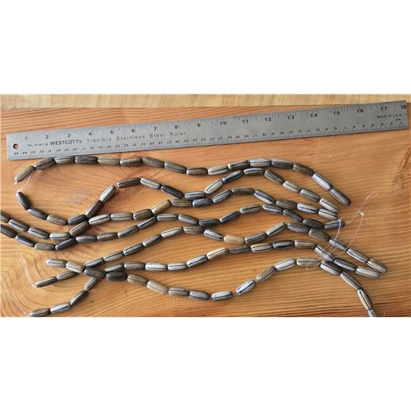 Seven Strands of Kamagong Grooved Peanut Wood Beads