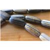 Image 2 : Seven Strands of Kamagong Grooved Peanut Wood Beads