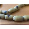 Image 3 : One Forty Inch Strand of Antique Yellow Sand Cast Beads