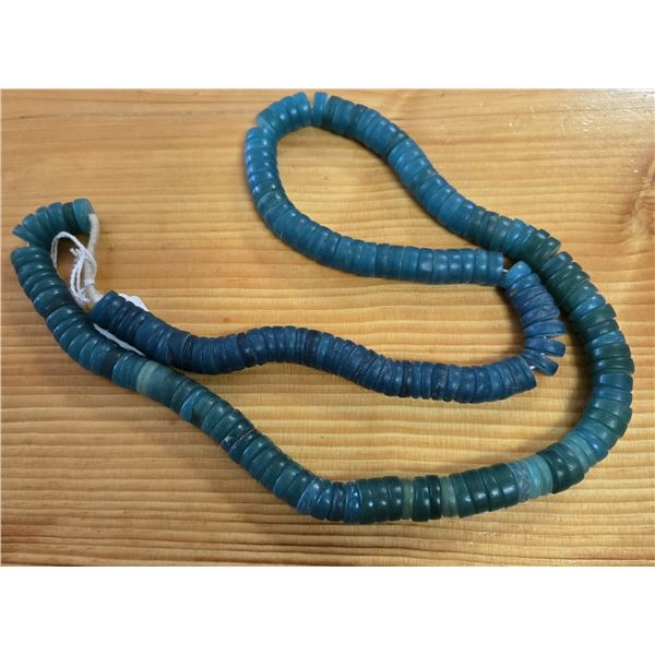 One Thirty Inch Strand of Emerald Green Antique Kambora Trade Beads