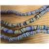 Image 2 : Two 24” Antique Venetian Yellow Sand Cast Trade Beads