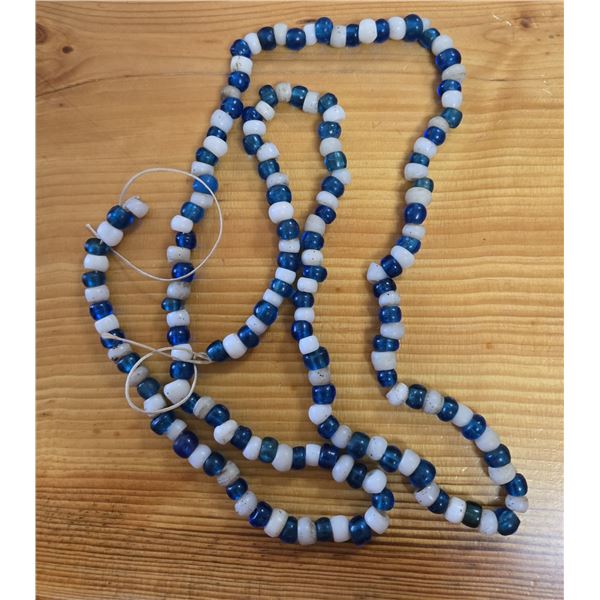 One 42” Antique Opaque White and Translucent Blue Venetian Padre Beads