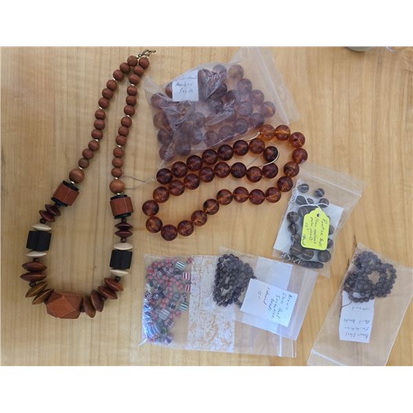 Miscellaneous Lot of Trade Beads and One Wooden Bead Necklace