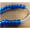 Image 2 : One 24” Strand of Antique Translucent Blue Padre Beads