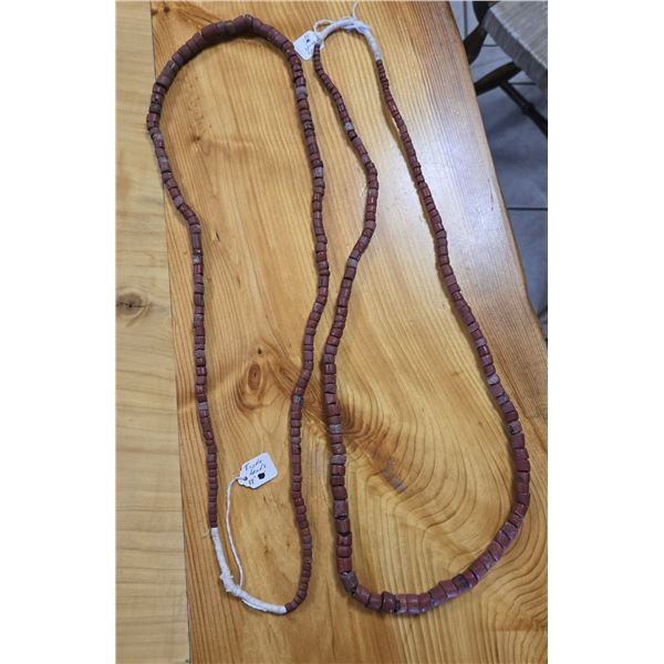 Two Thirty-eight Inch Strand of Antique Graduated Bauxite Trade Beads